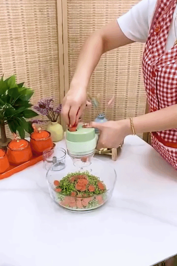Introducing the 4 in 1 Handheld Electric Vegetable Cutter Set - chop, slice, and mince with ease!